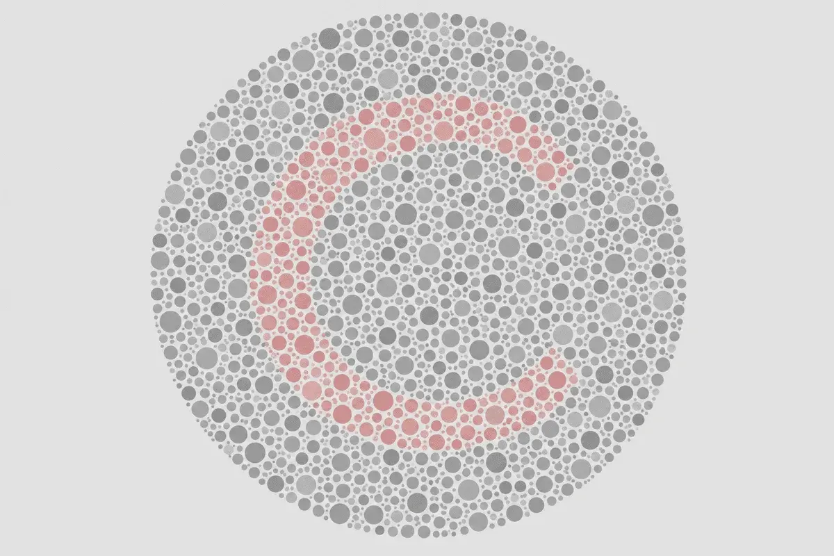 A circular field of many grey dots of varying size and brightness, with a ring shaped like the letter C picked out in faint red dots and a gap opening on the right side
